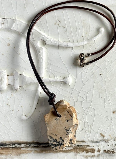 Fossil on brown leather