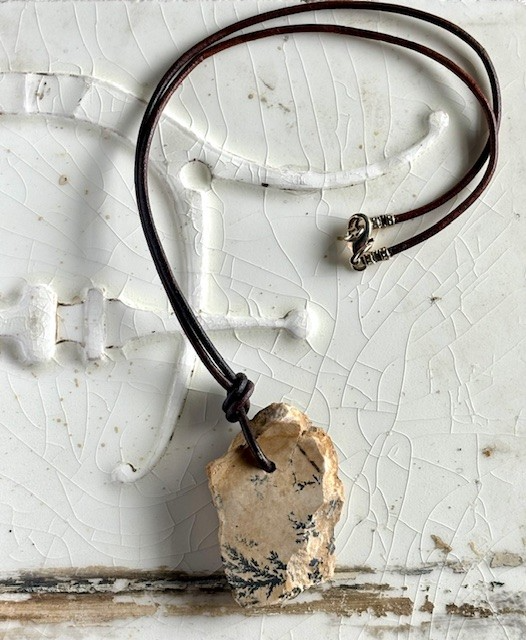 Fossil on brown leather