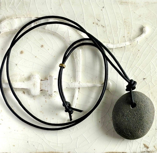 Beach rock on black leather cord