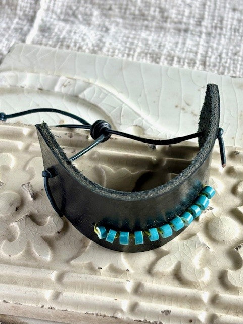 Black leather bracelet with turquoise