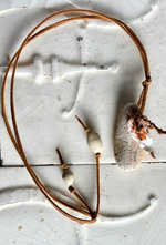 Beach rock with shell and carnelian beads