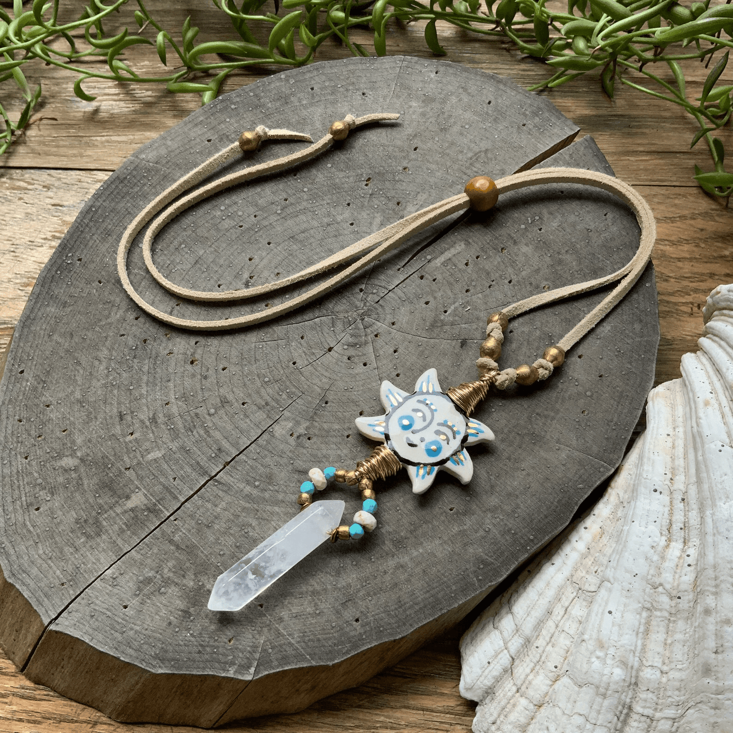Folk art ceramic Sun and Crystal point necklace on beige vegan suede cord