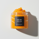 NEW SKIN, A FOAMING TURMERIC SCRUB