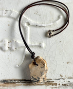 Fossil on brown leather