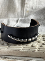 Black leather with silver beads 